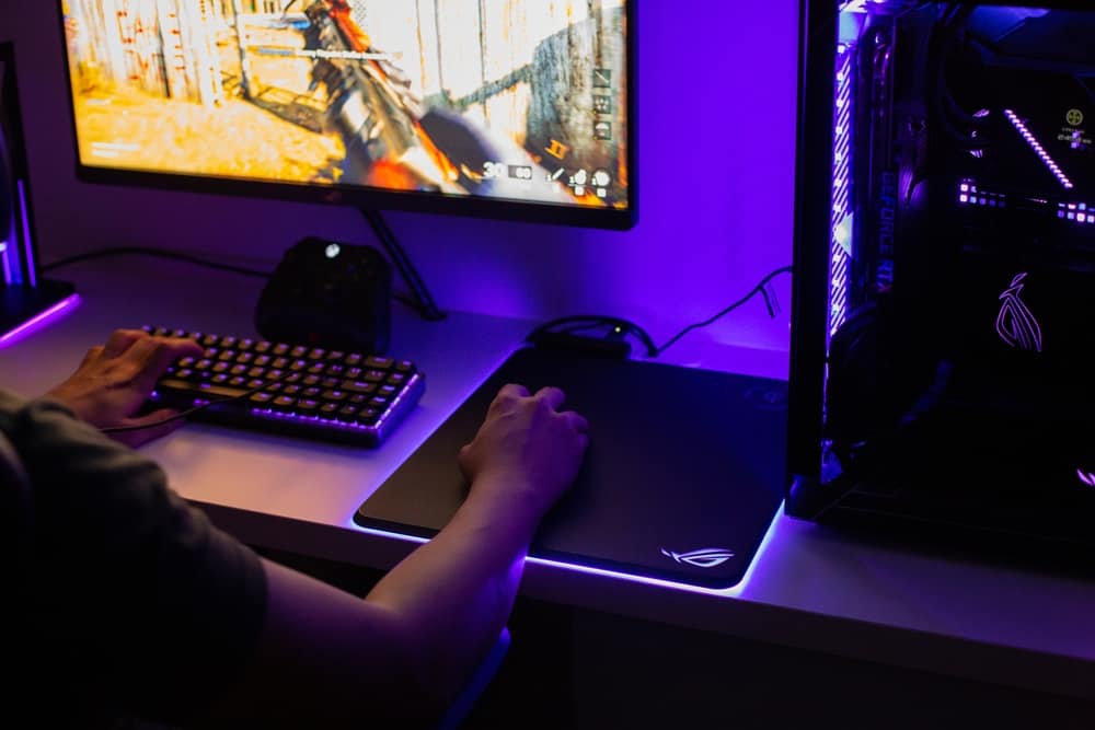 Gaming rig at a desk in this image from Shutterstock