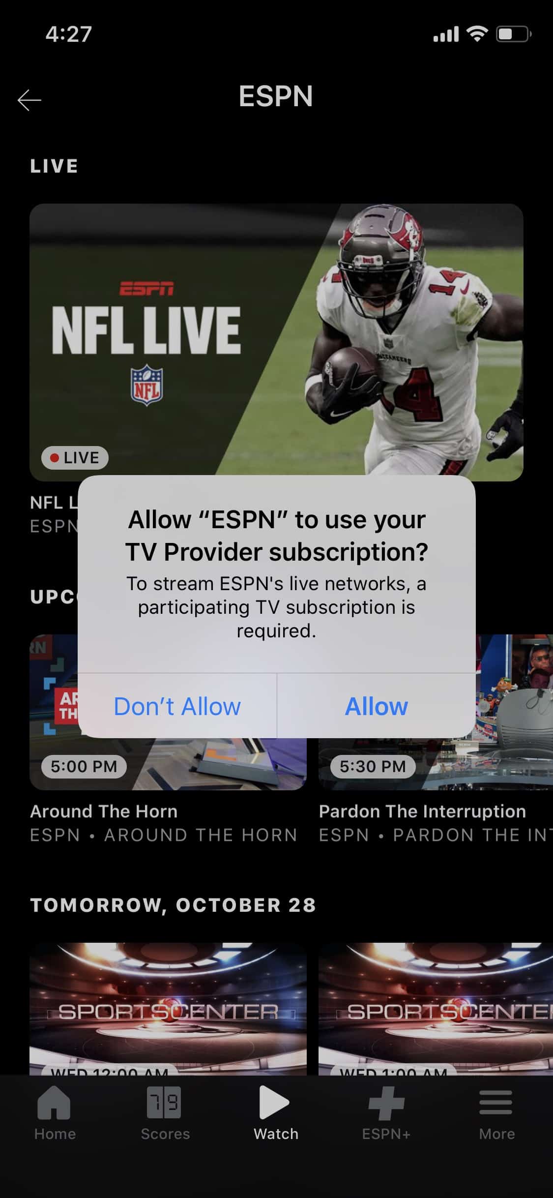 Screenshot of the ESPN app with pop-up notification on iOS