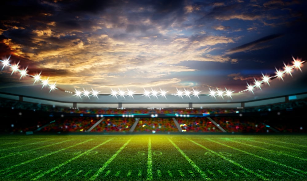 Green football field in a stadium