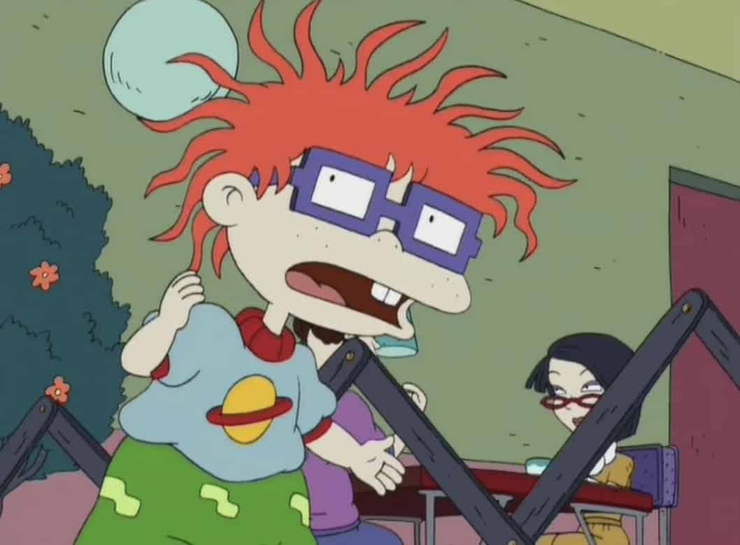 Chuckie in the show Rugrats planning an escape from the playpen