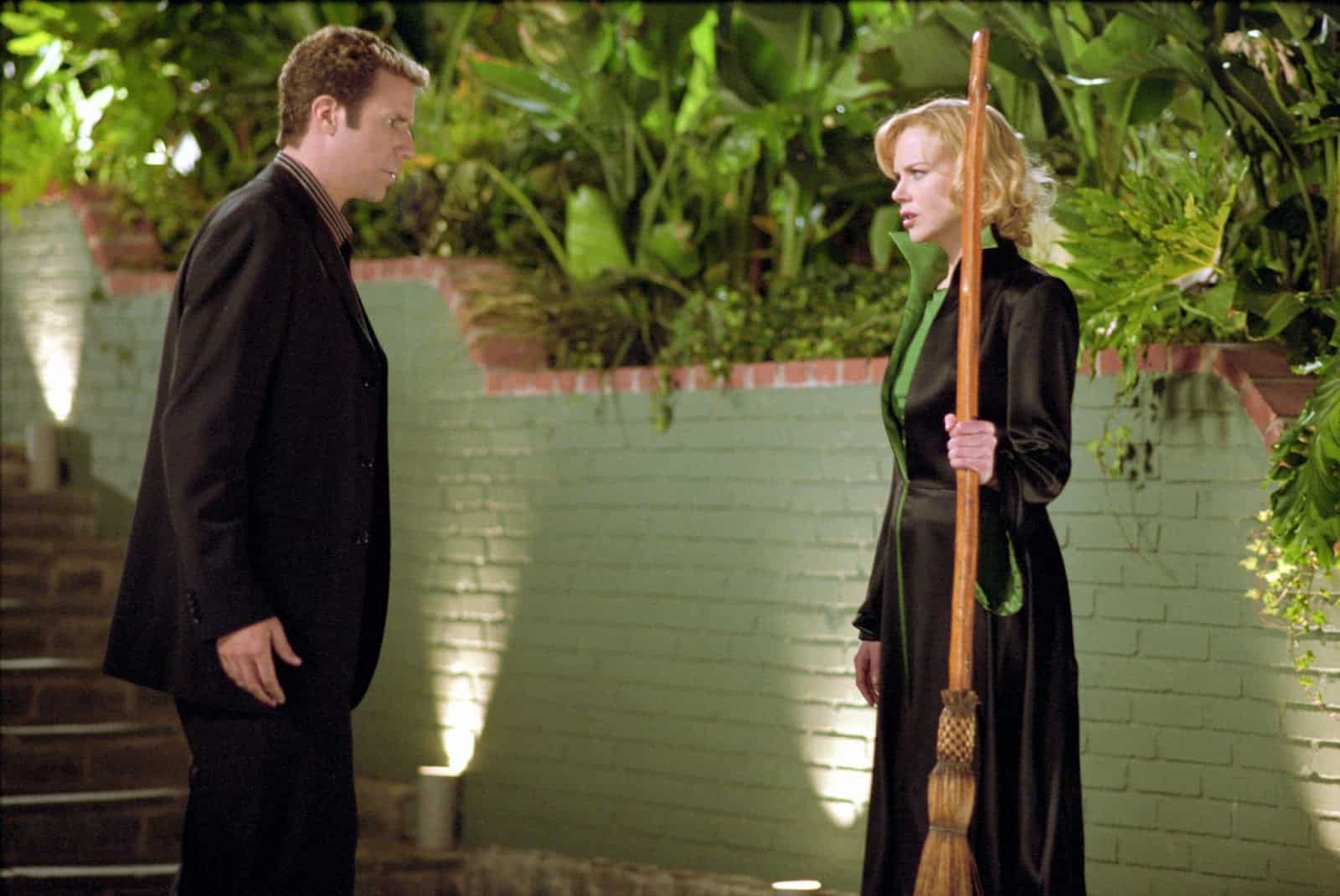 A man argues with a woman holding a broomstick in this image from Columbia Pictures.