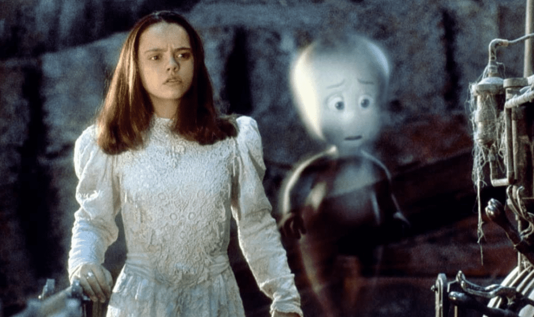 A young girl and a ghost in this image from Universal Pictures.
