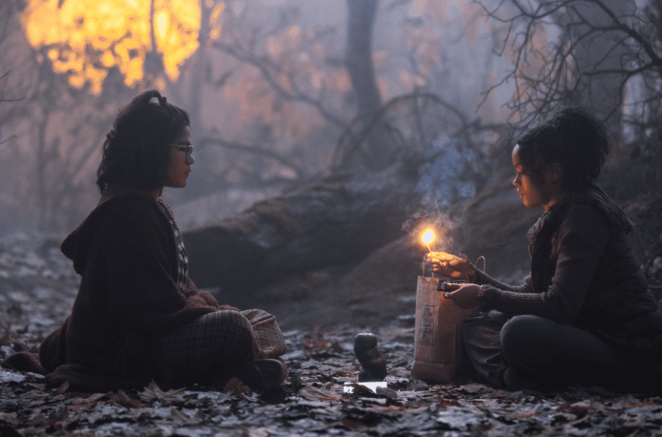 Izzy and Becca lighting up the black flame candle