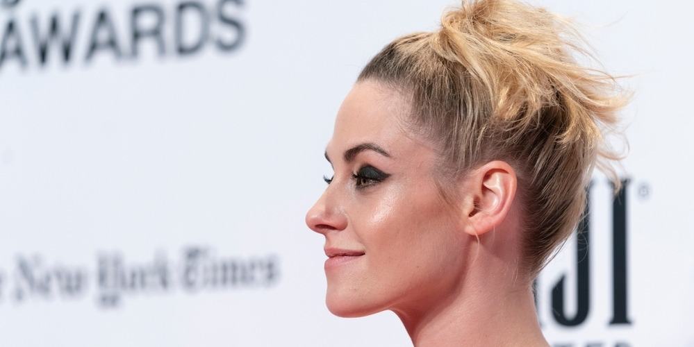 Kristen Stewart smiles on the red carpet in this image from Shutterstock