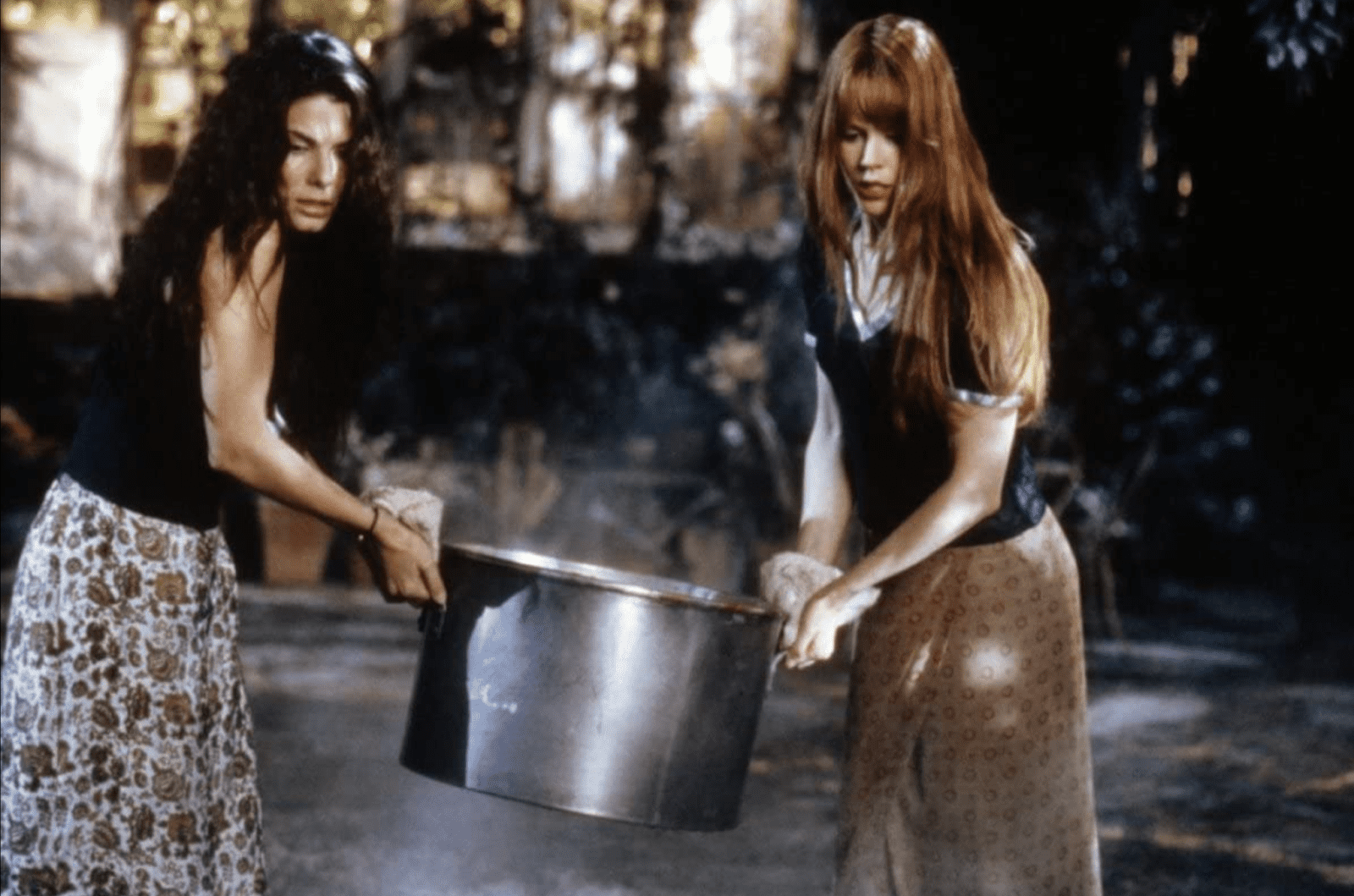 Two sisters carry a large pot in this image from Stargate Studios.