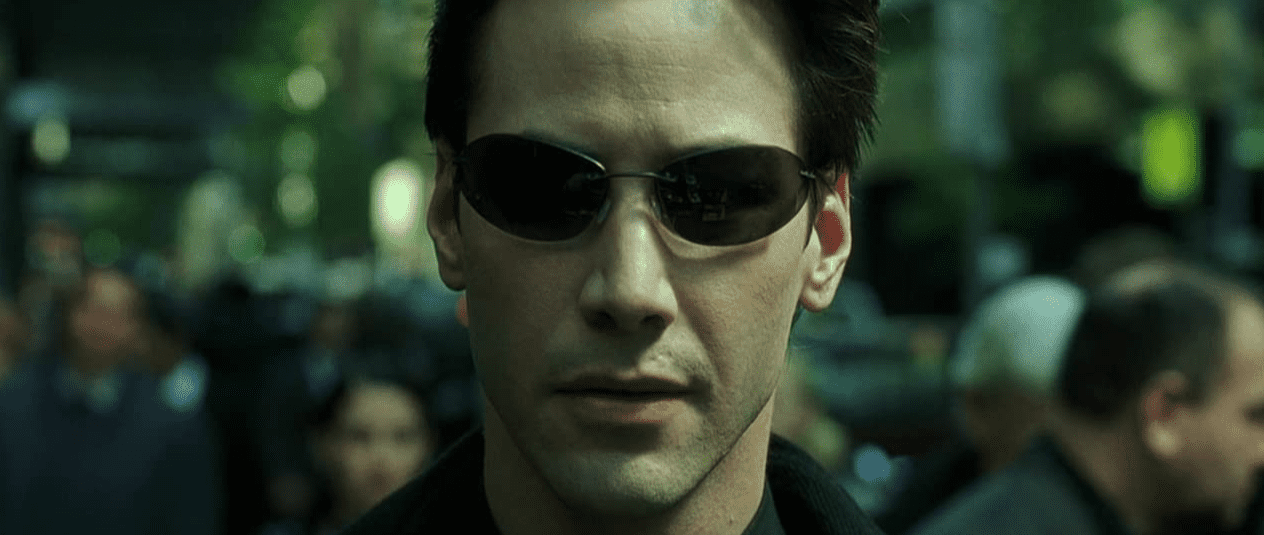 Keanu Reeves playing Neo in “The Matrix”