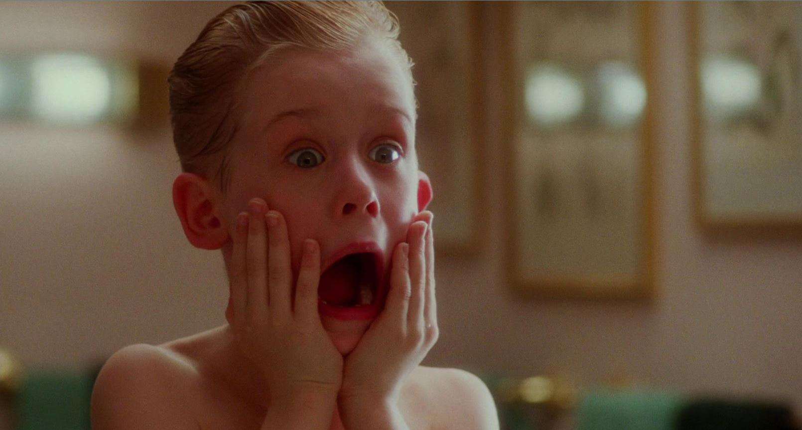 Kevin McCallister doing his signature scream with both hands on his face