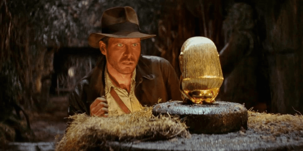 Indiana Jones admiring a golden idol