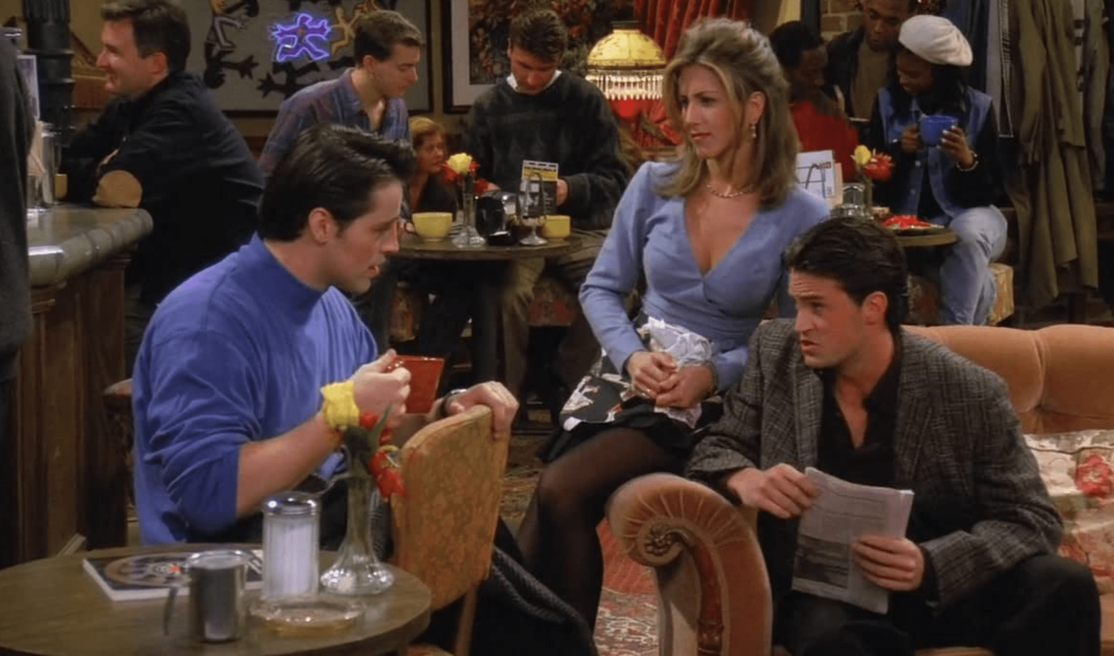 Joey, Rachel, and Chandler chat at Central Perk.