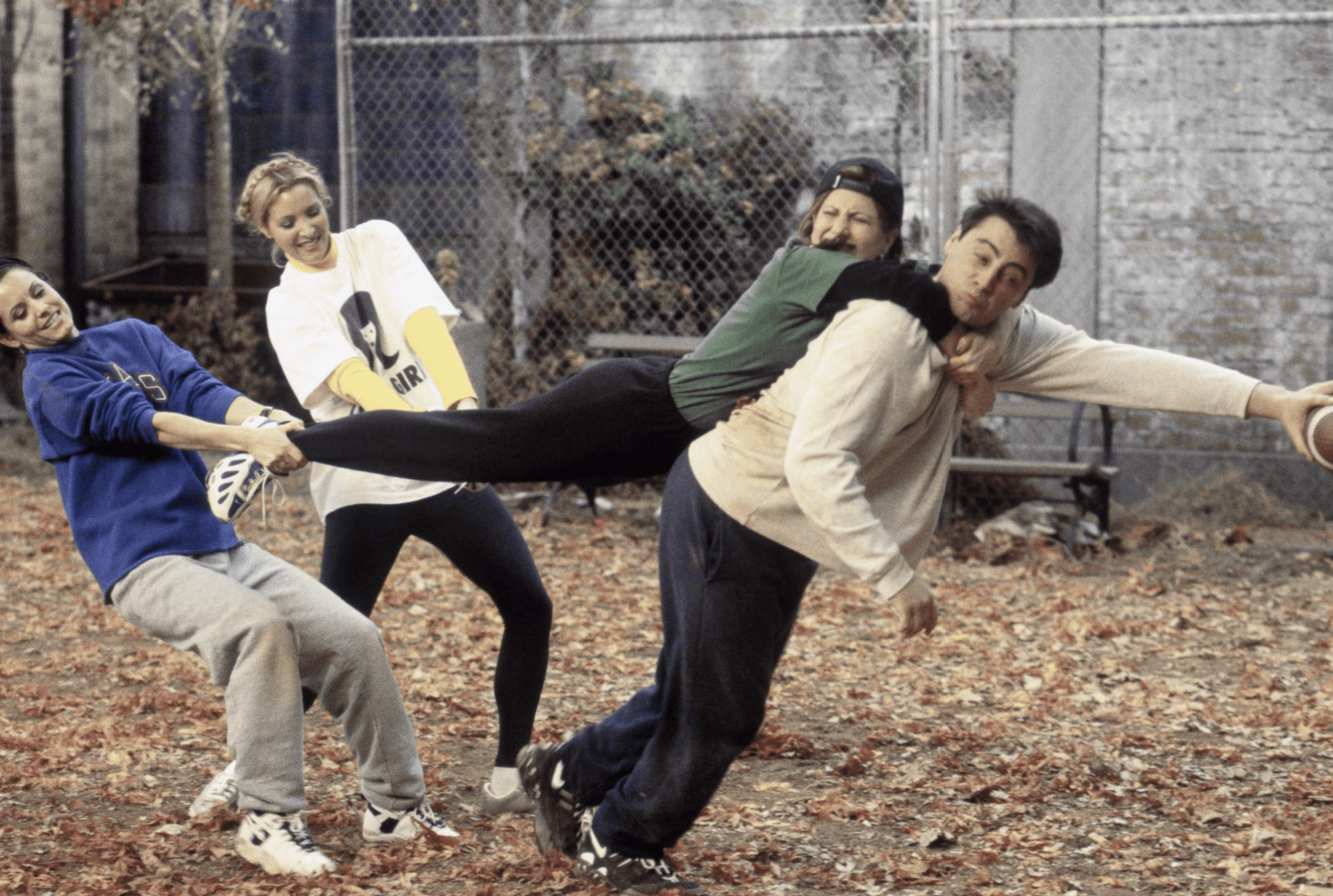 Monica, Phoebe, Rachel, and Chandler during a game of touch football at the park