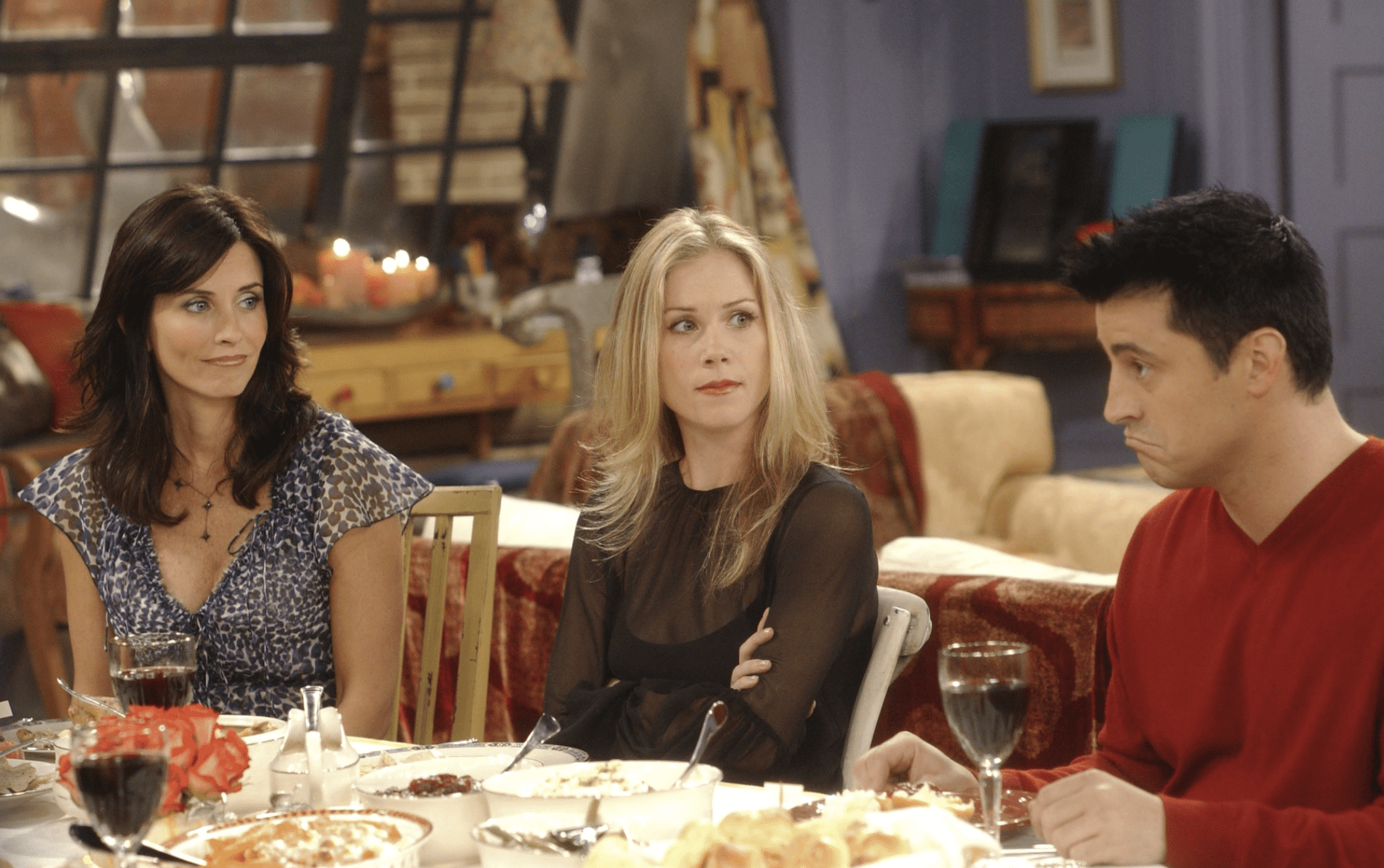 Monica, Amy, and Joey sit at the dinner table.