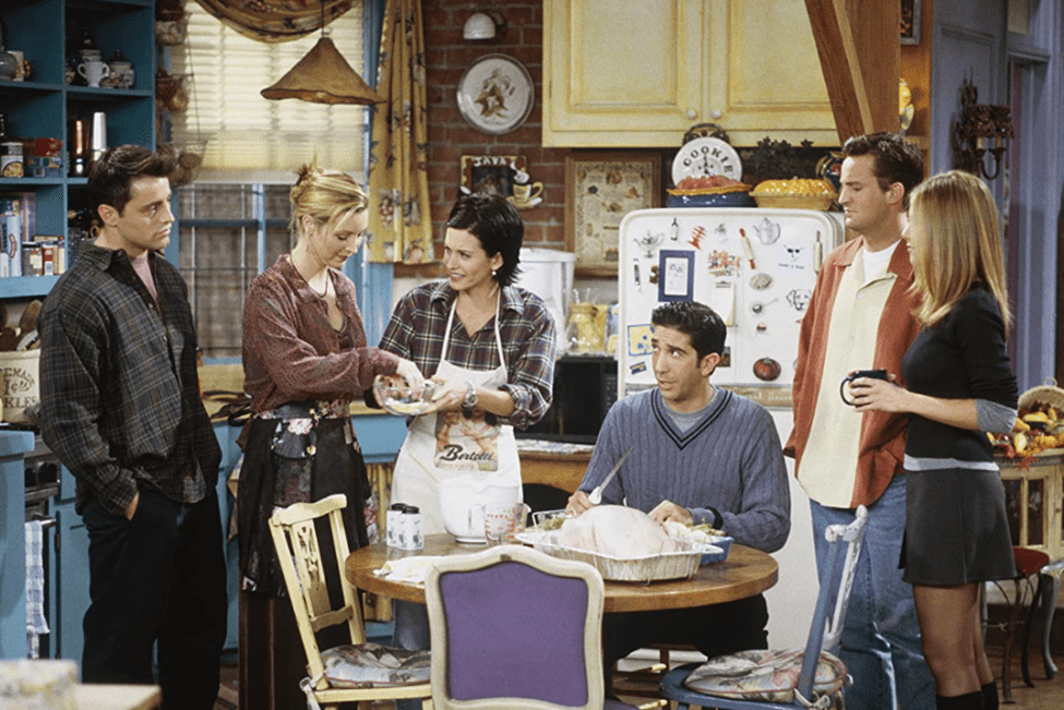 The cast of “Friends” hanging out in the kitchen