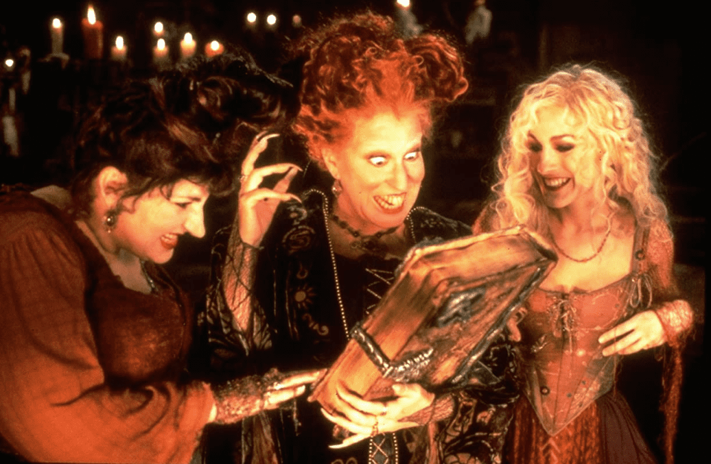 The Sanderson Sisters smile at Book