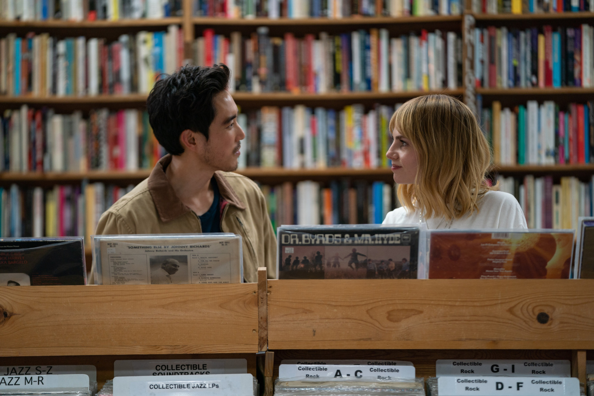 A man and woman in a record store in this image from Far Hills Pictures.