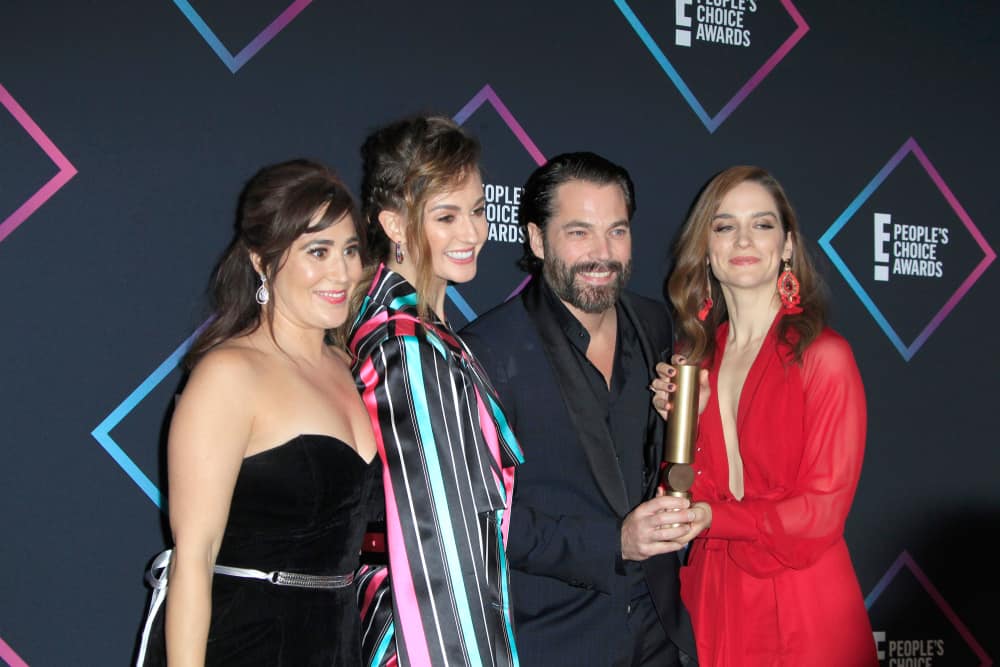 Emily Andras, Melanie Scrofano, Tim Rozon, and Katherine Barrell at the People's Choice Awards 2018 (Image: Shutterstock)