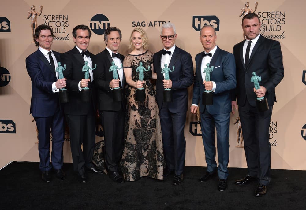 The “Spotlight” cast holding their awards on the red carpet
