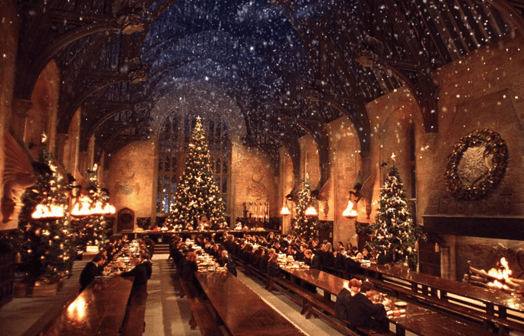 Festive Christmas displays decorate the Great Hall at Hogwarts