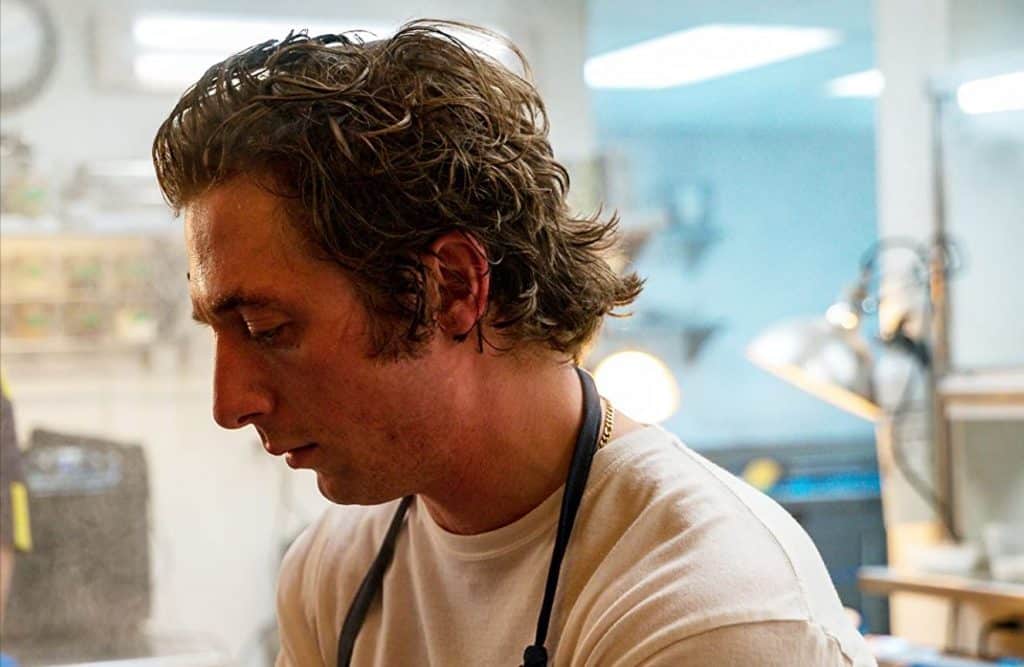 Close-up shot of Carmen “Carmy” Berzatto in his restaurant’s kitchen