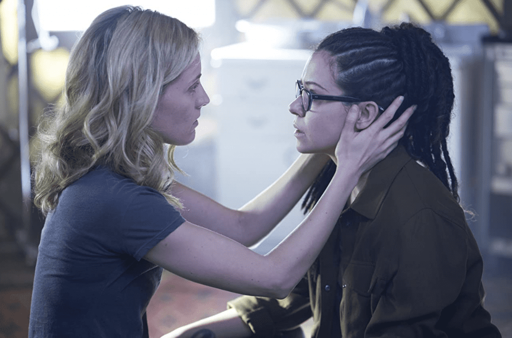 Delphine Cormier holding Cosima Niehaus’s head from “Orphan Black”
