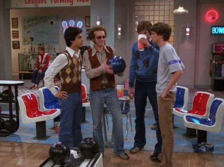 Fez, Steven, Michael, and Eric hang out at the bowling alley