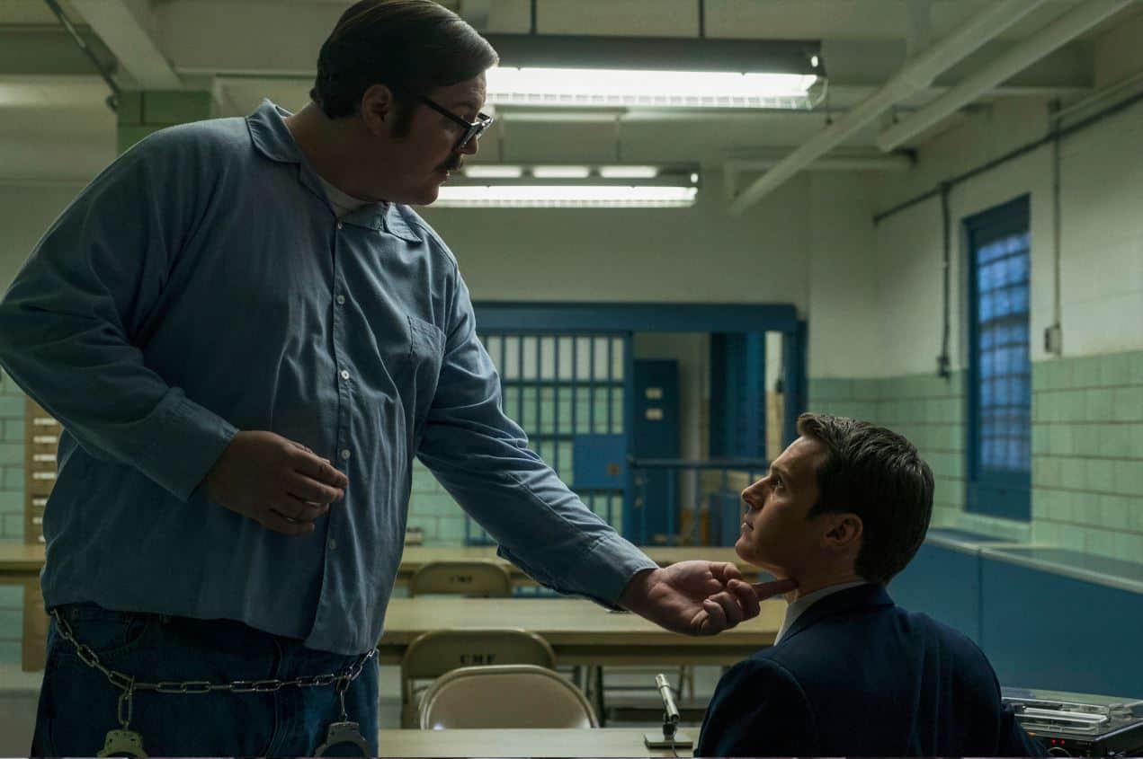 Ed Kemper touches Holden Ford’s throat in the show “Mindhunter”