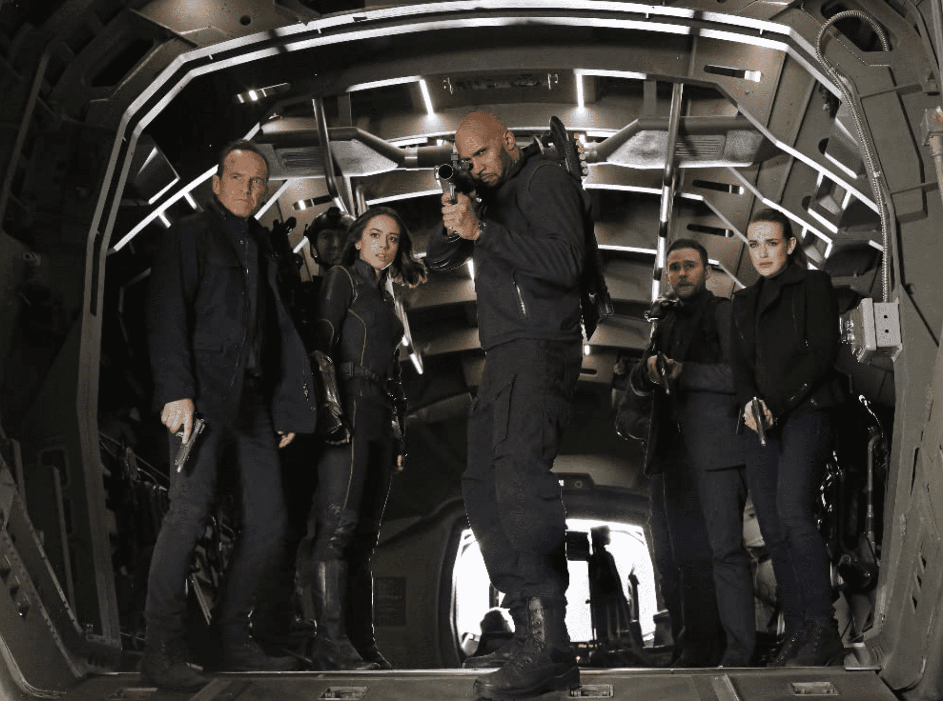 S.H.I.E.L.D. standing in an airplane while waiting for battle