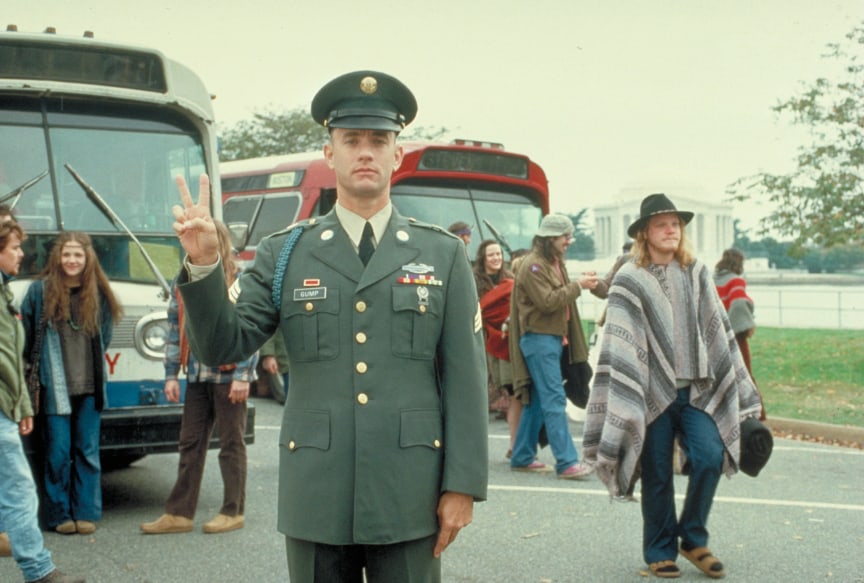 Forrest Gump in army uniform at a hippie march