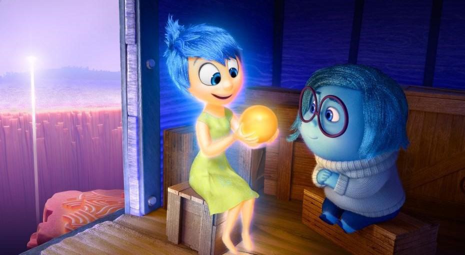 Joy showing Sadness a glowing memory ball