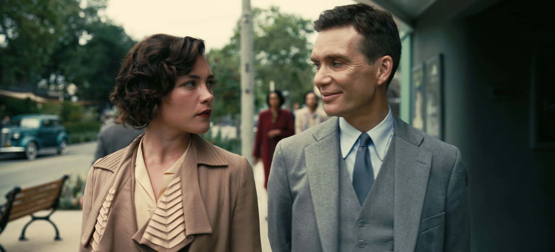 A couple faces each other as they walk down the street in this image from Universal Pictures.