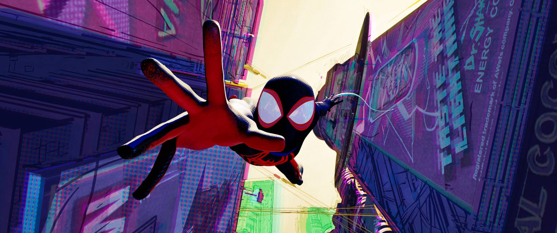 Spider-Man flying between buildings in this image from Columbia Pictures.
