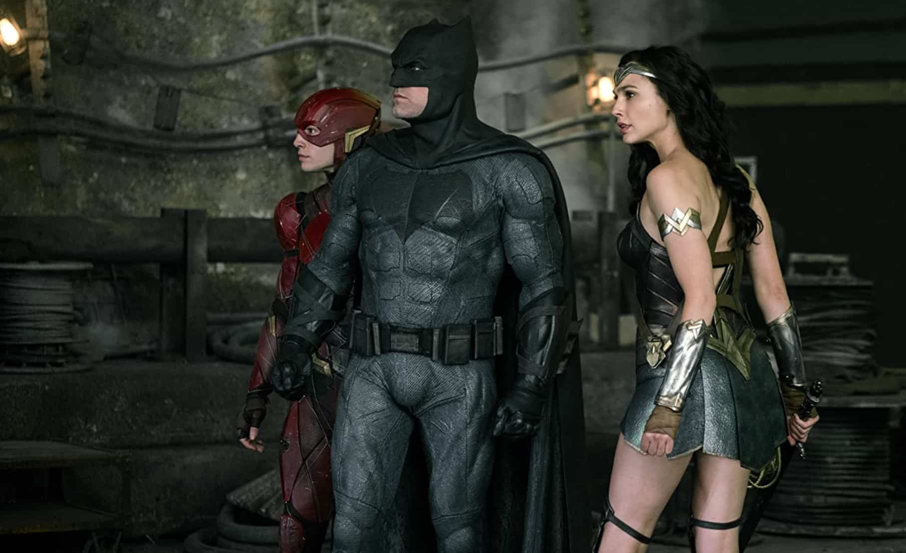 Three people in superhero costumes in this image from HBO Max 