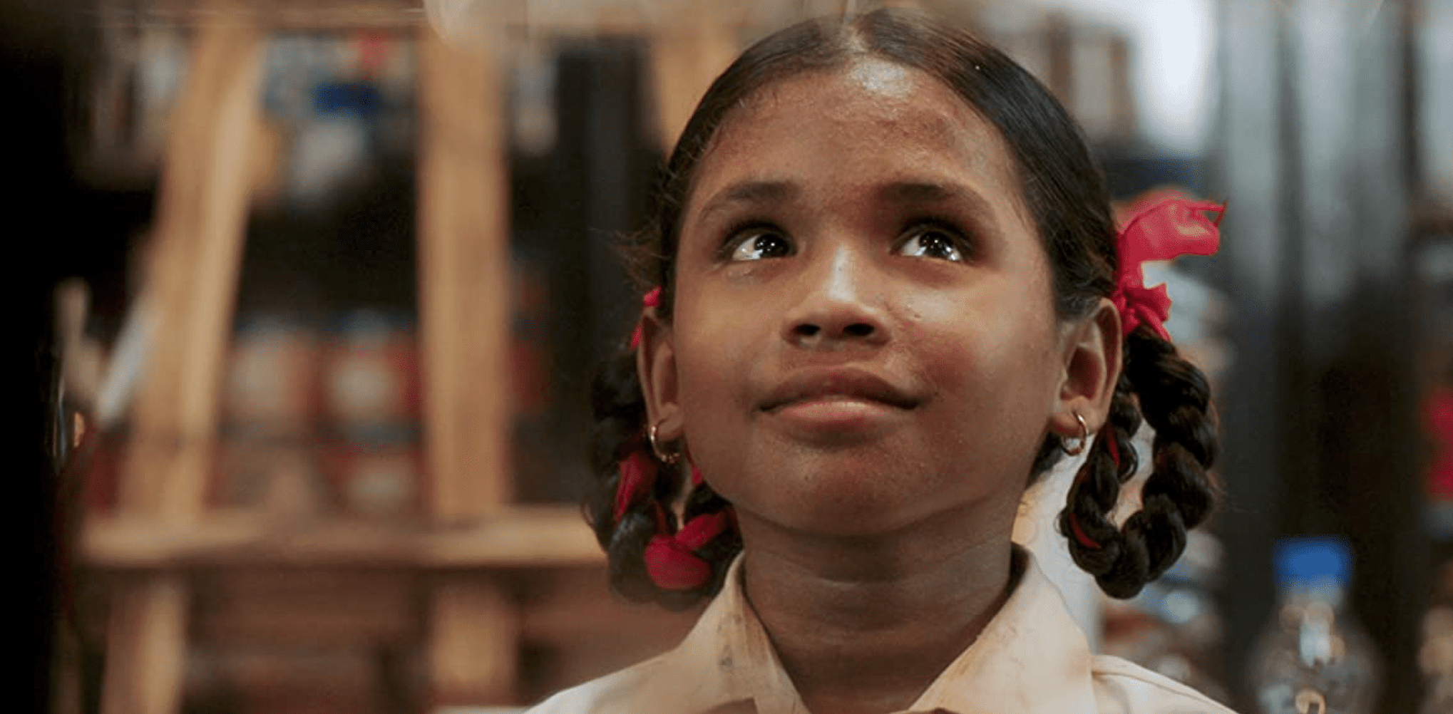 A young student gears up for a day at school in this image from Peacock 