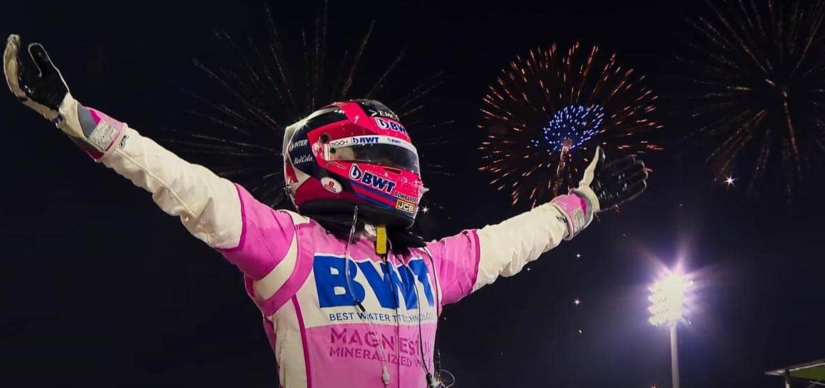 A racing driver celebrates in this image from Netflix
