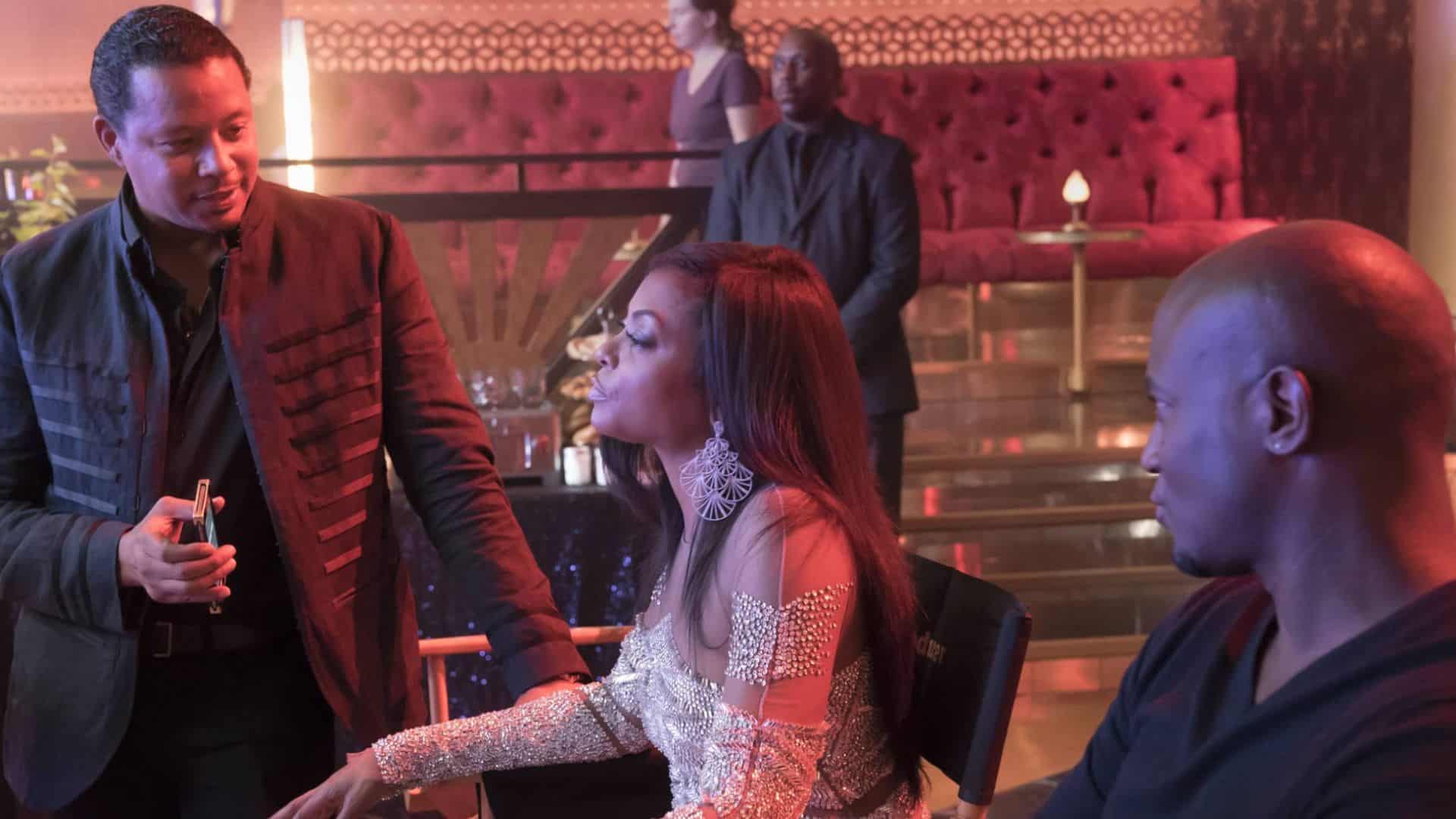 Lucious, Cookie, and Angelo discuss something while sitting in a nightclub in this image from Hulu.