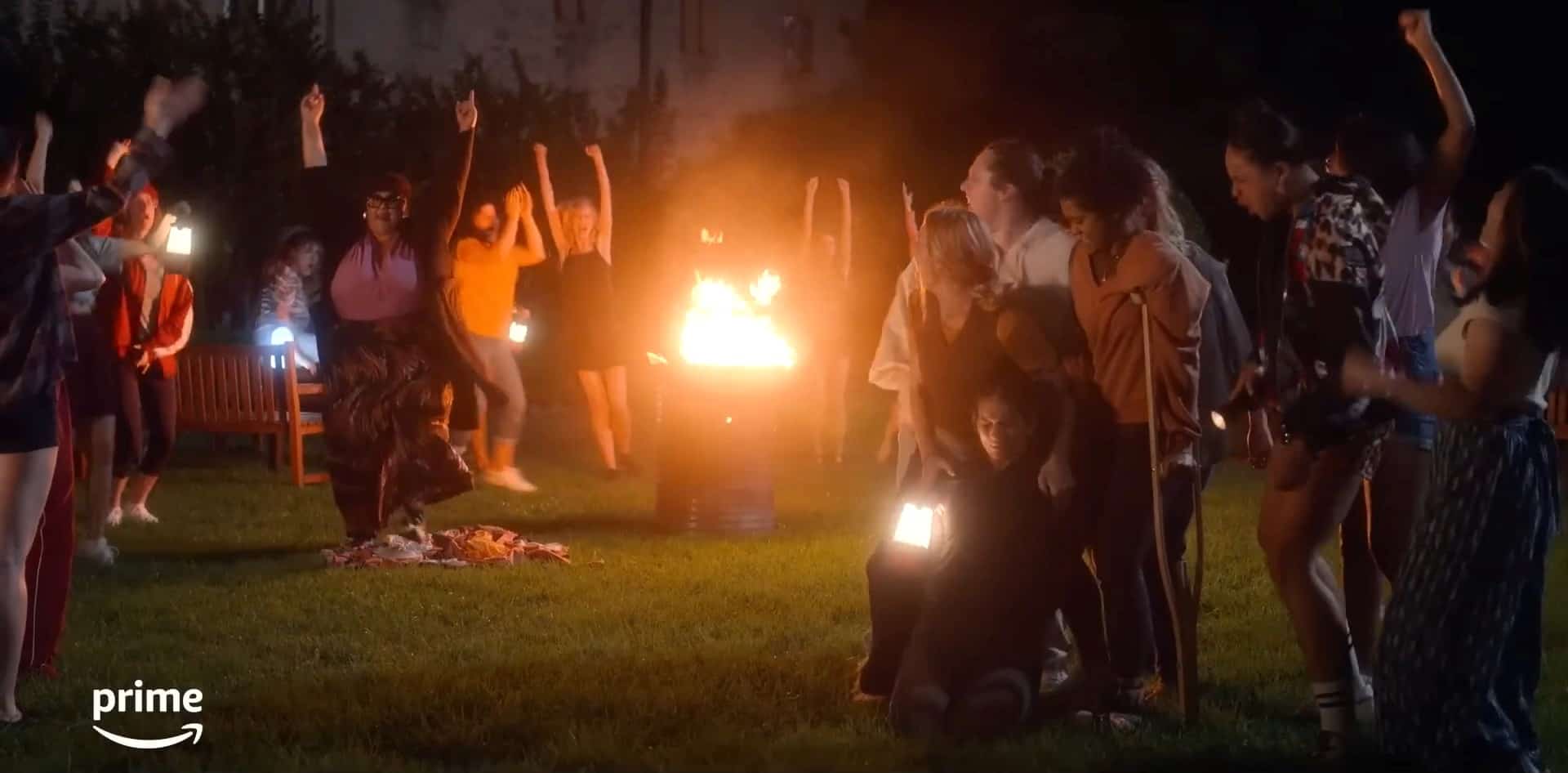 Women gather around a fire in this image from Amazon Prime Video