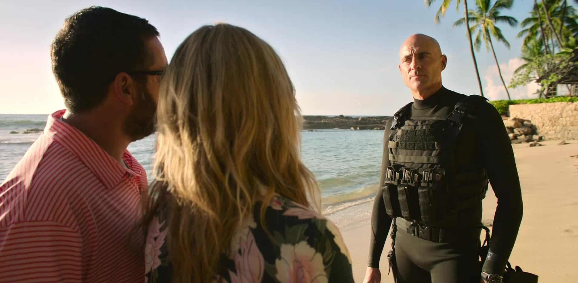 Adam Sandler, Jennifer Aniston, and Mark Strong in this image from Netflix