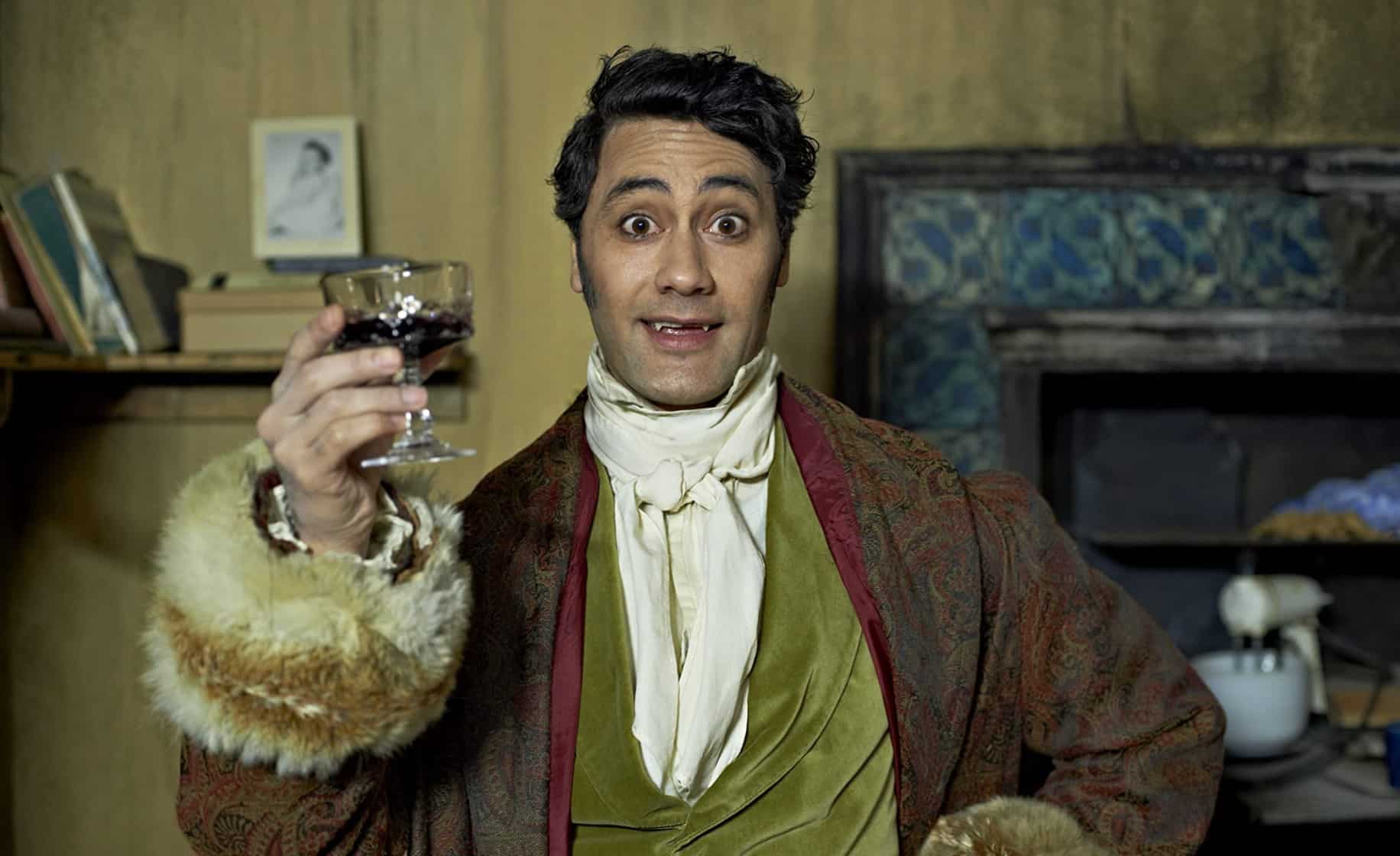 A vampire holds a goblet of blood in this image from Amazon Prime Video