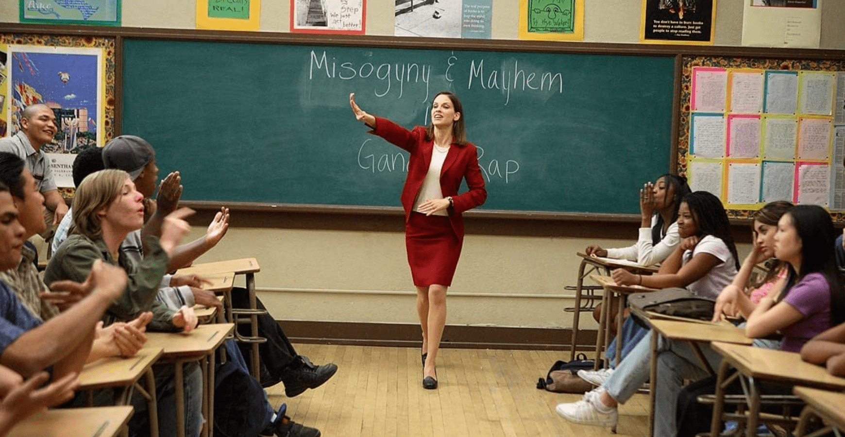A teacher talks to her class separated by gender in this image from Hulu