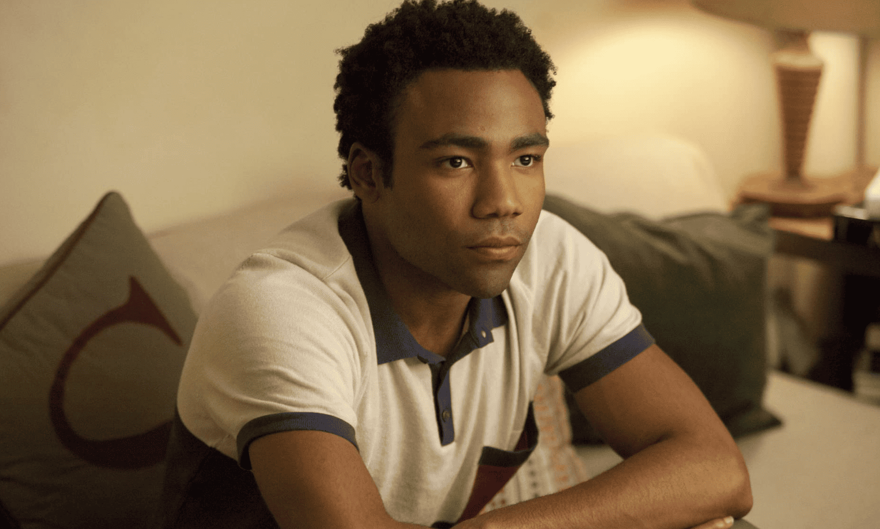 A pensive Donald Glover looks off-camera in this image from Apatow Productions