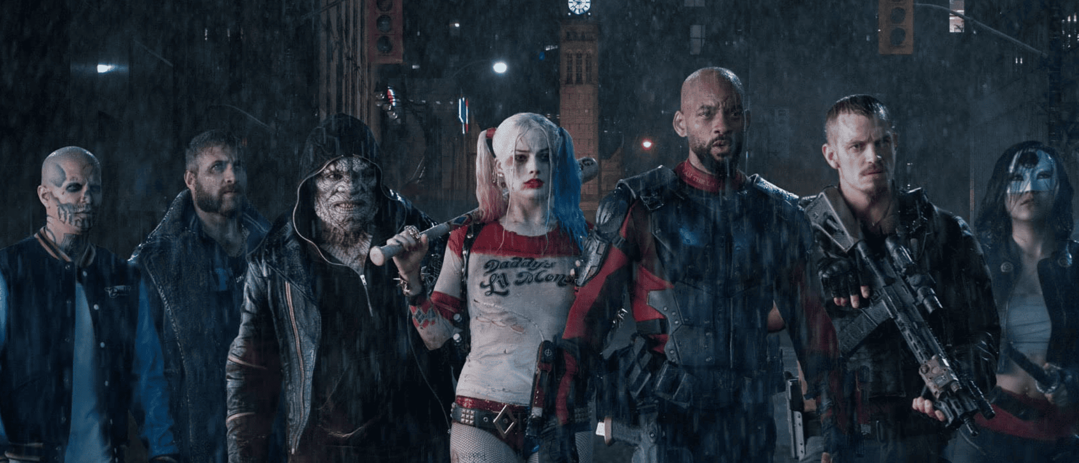 The Suicide Squad stands in the rain, ready for battle in this image from DC Studios.