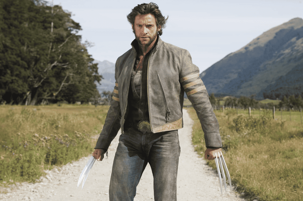Wolverine stands in his leather jacket and claws out in this image from Hulu