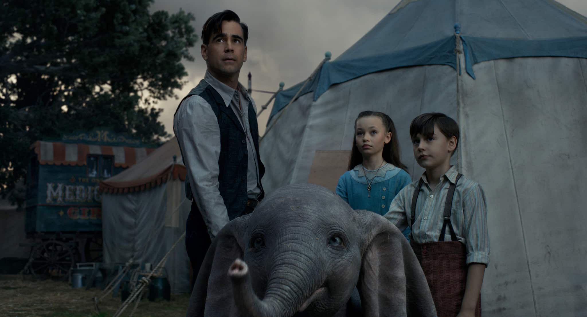 Colin Farrell, Nico Parker, and Finley Hobbins in this image from Walt Disney Studios Motion Pictures
