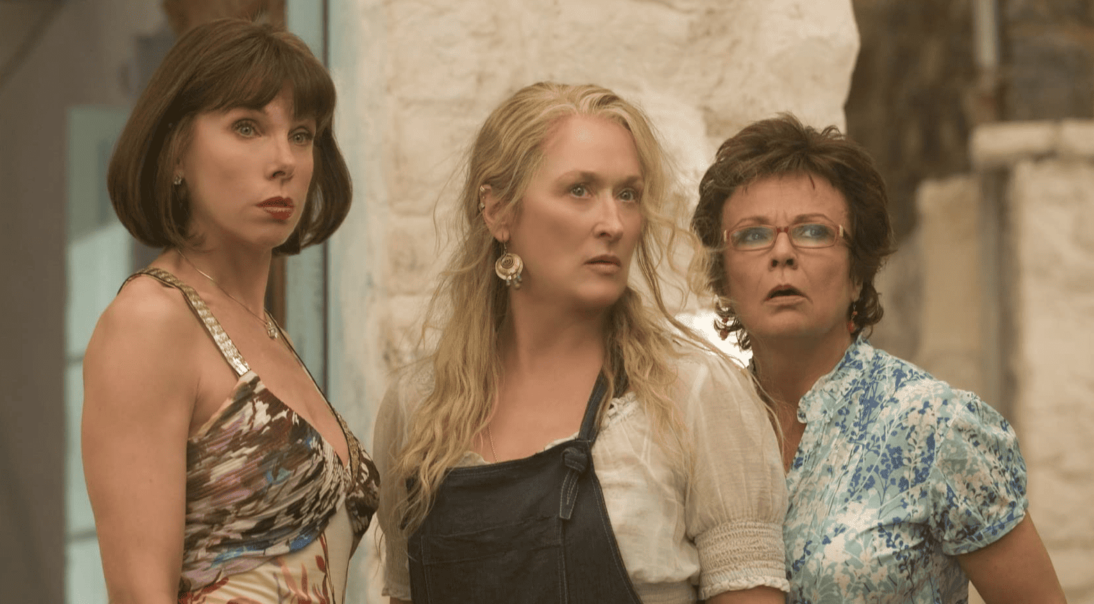 Christine Baranski, Meryl Streep, and Julie Walters stare off-camera in this image from Amazon Prime Video
