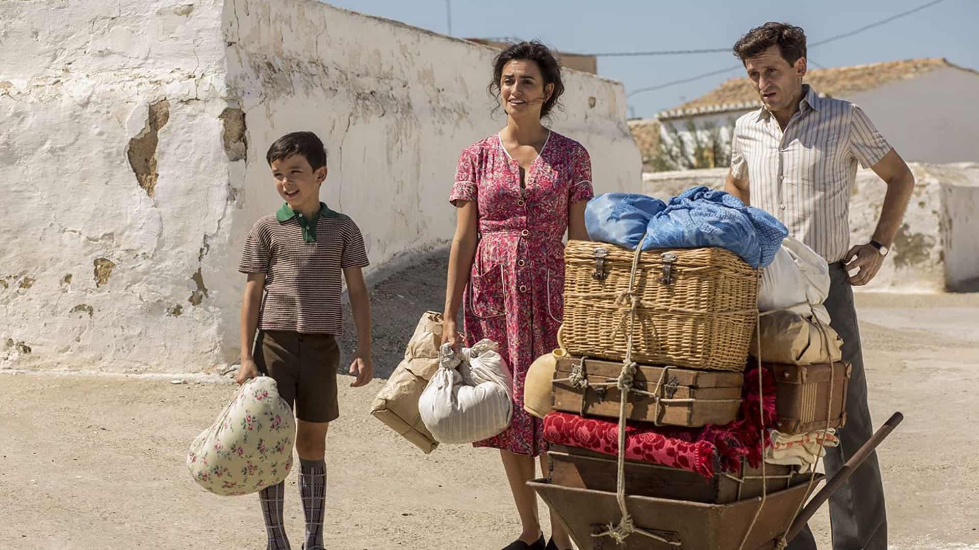 Salvador, Jacinta, and Venancio stand beside their belongings as they admire their new home in this image from Sony Pictures Classics