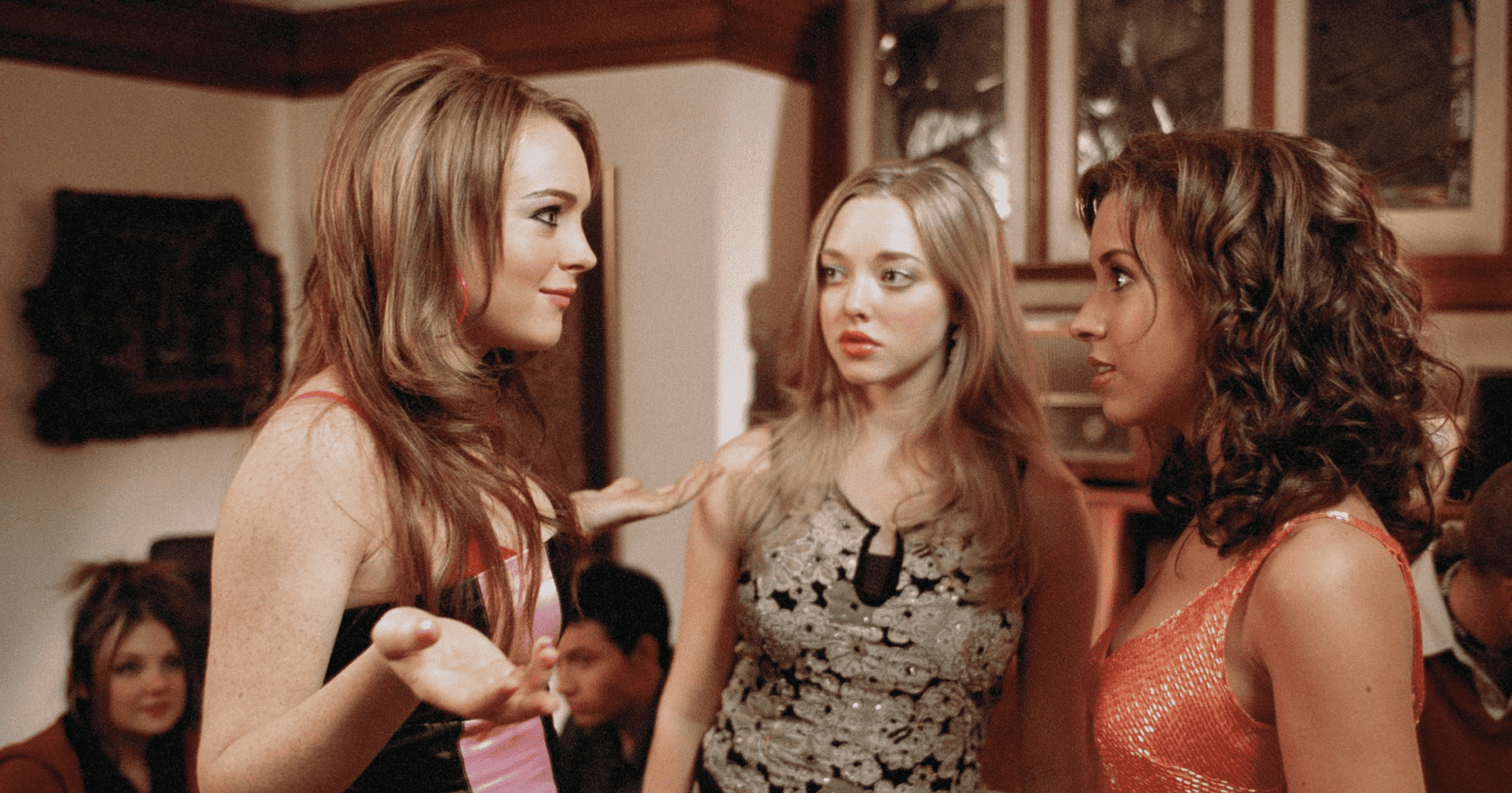 Cady, Karen, and Gretchen standing together at a Halloween house party in this image from Paramount Pictures.