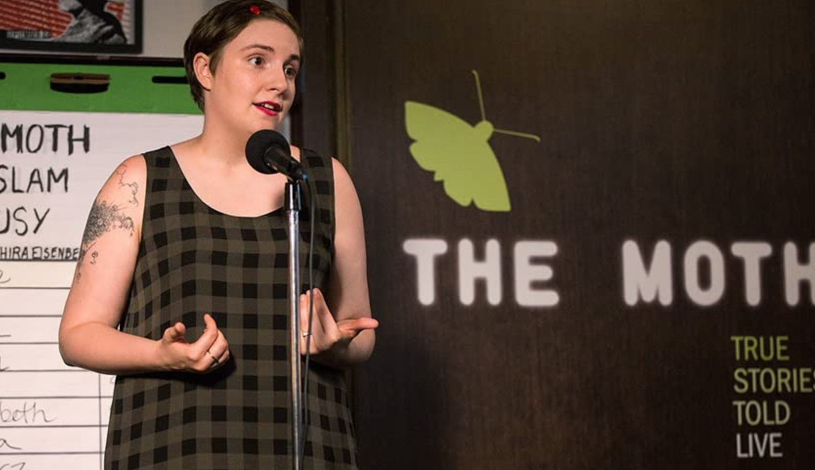Hannah (Lena Dunham) in the middle of a poetry reading in this image from Apatow Productions