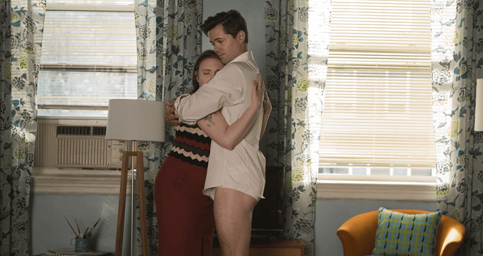 Elijah hugs his roommate Hannah in this adorable image from Apatow Productions