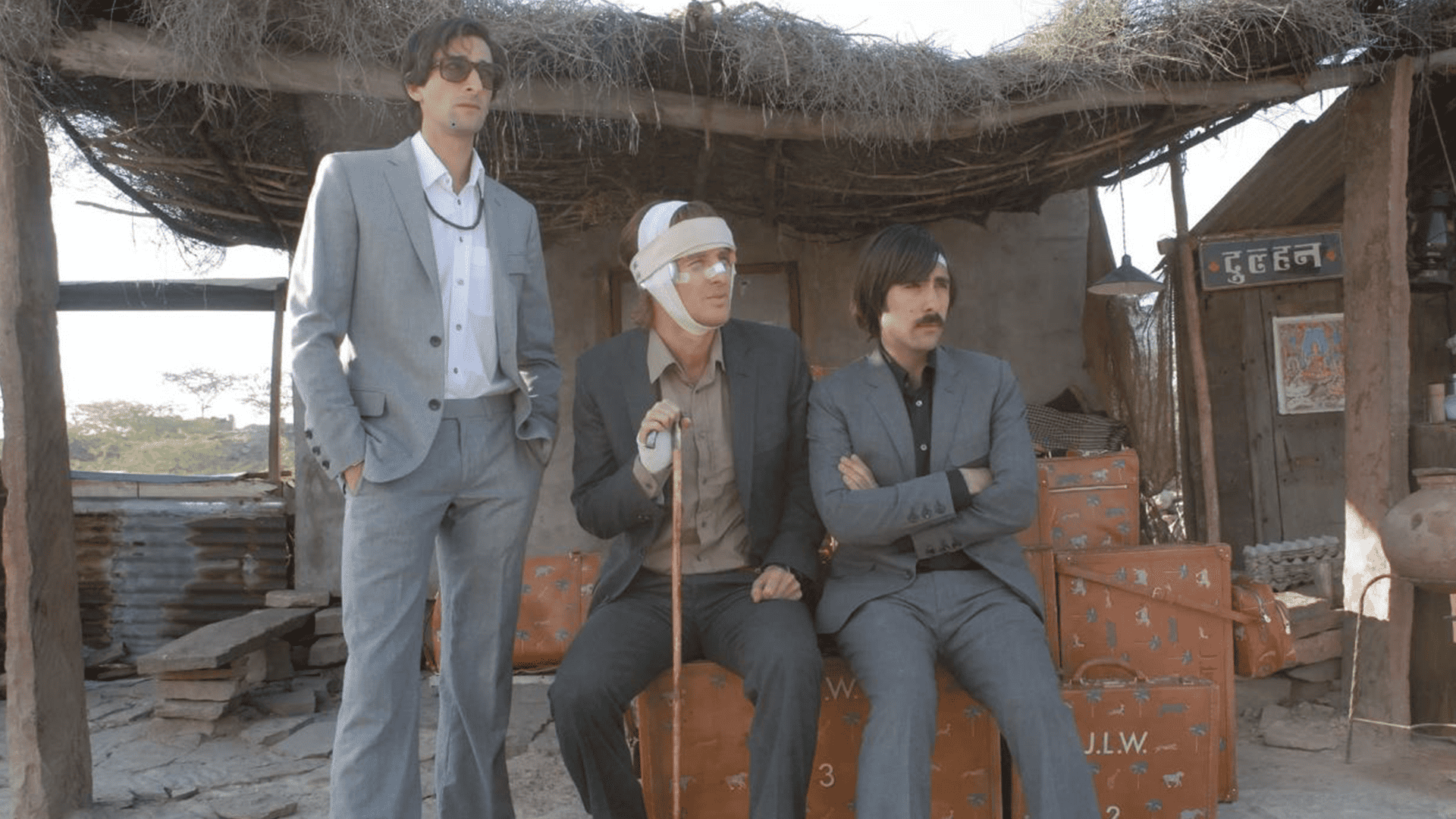 Adrien Brody, Owen Wilson, and Jason Schwartzman with a collection of luggage in this image from Indian Paintbrush