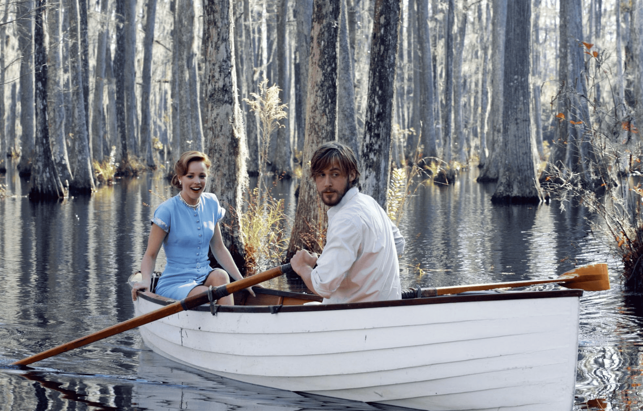 A young couple in a row boat in this image from New Line Cinema 