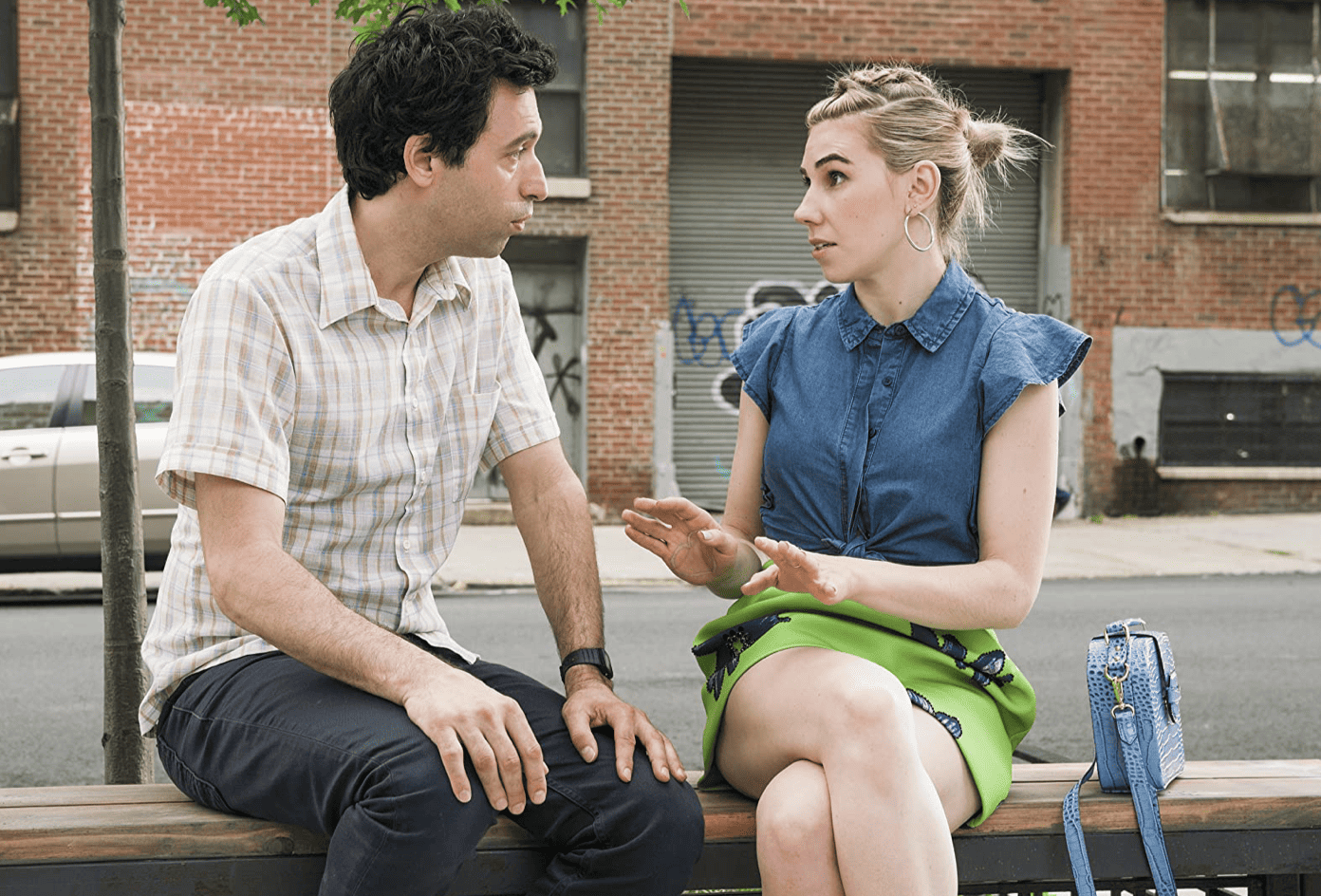 Shoshanna having what looks like a tense conversation with her boyfriend Ray in this image from Apatow Productions